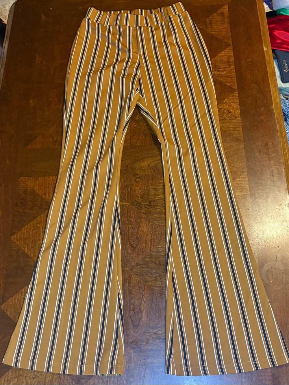 Altrd state work or play flare pants in size Xs burnt orange and black size XS